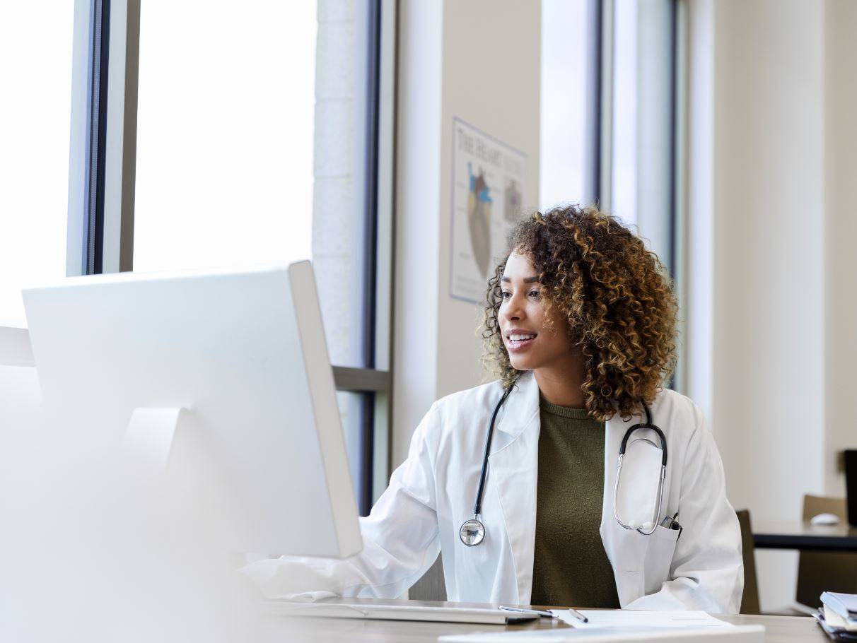 Veterinarian working on her computer