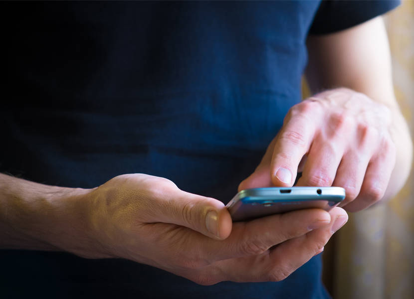 person scrolling on phone